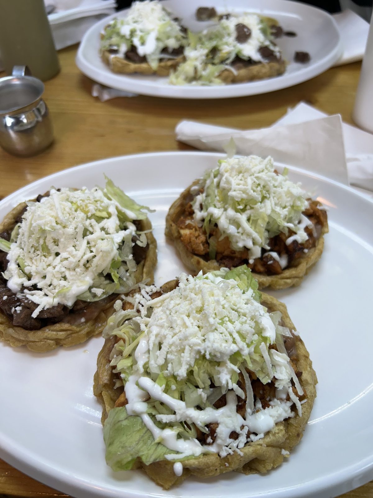 Sopes with lettuce and queso fresco