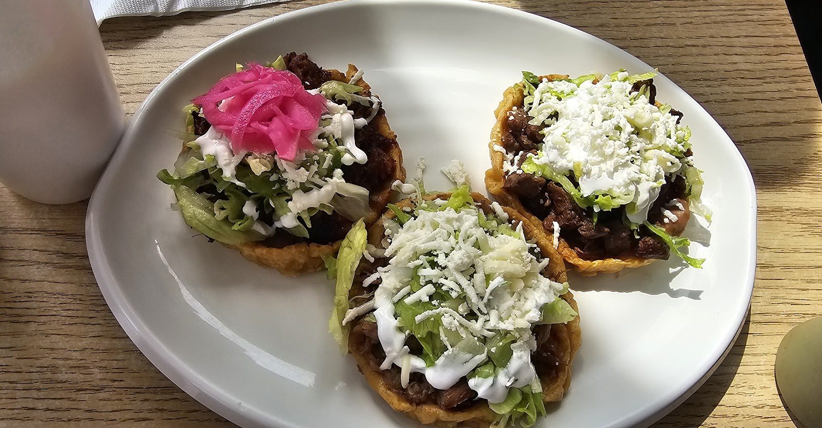 Sopes with pickled onions
